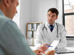 A DPC physician talking to his patient.