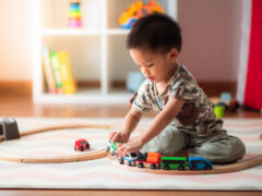 Baby playing with toys