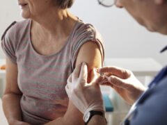 An older woman gets a flu shot. There are a lot of myths surrounding the flu.